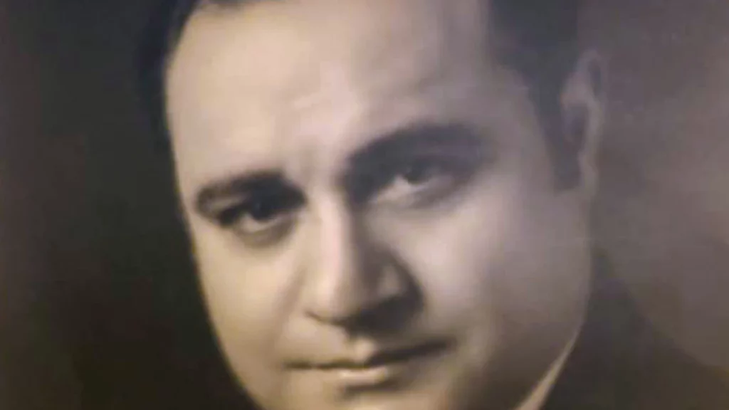 Immagine di un ritratto in primo piano di Beniamino Gigli giovane